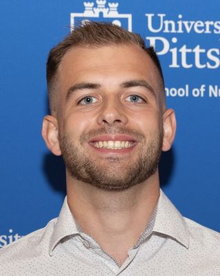 Photo of Tanner Herb, Psychiatric Nurse Practitioner, DNP, PMHNP