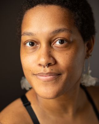 Photo of Emani Sullivan, Marriage & Family Therapist, MS, LMFT