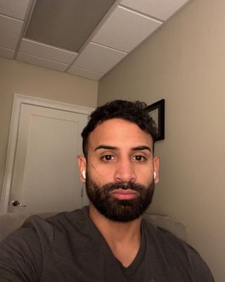 Photo of Shawn Carlo Holland, Counselor, LMHC