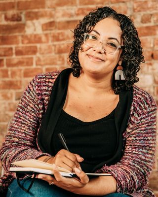 Photo of Hannah Taylor-Johnson, Registered Psychotherapist, BSc, DCiiat, AT, RP