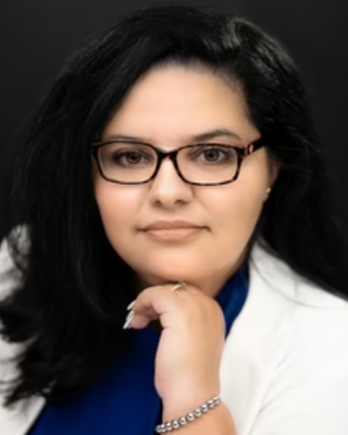 Photo of Elisa Sarmento, Counselor, LMHC