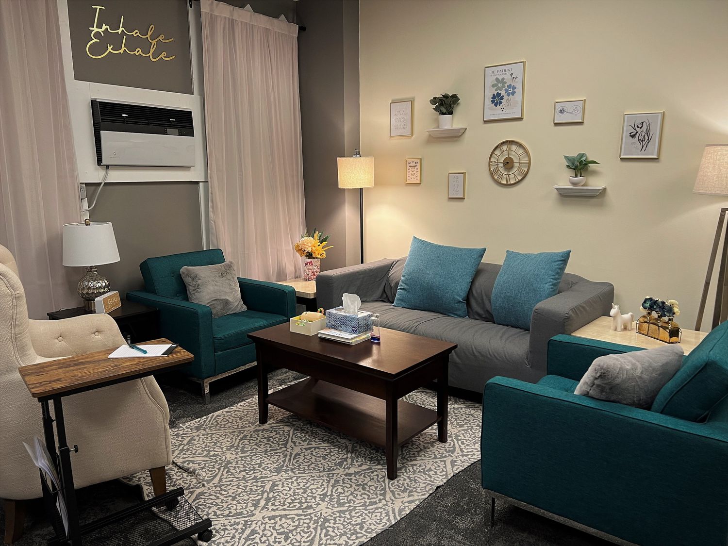 Gallery Photo of Main therapy space with loveseat and 2 arm chairs. 