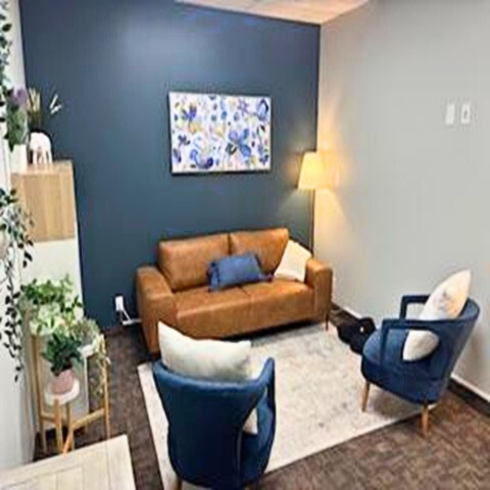 A spacious, welcoming office designed to feel calm, safe, and supportive of diverse sensory and regulation needs.