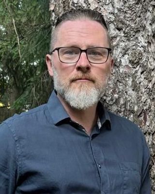 Photo of Simon Jo-Keeling, Registered Psychotherapist, MACP, PhD