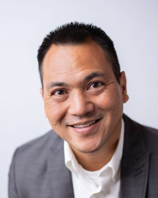 Photo of Justin Der, Counselor, LCPC, MA, M Div