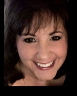 Photo of Kimberly M. Hogan, Licensed Clinical Professional Counselor, PhD, NPT-C, LCPC, CRC