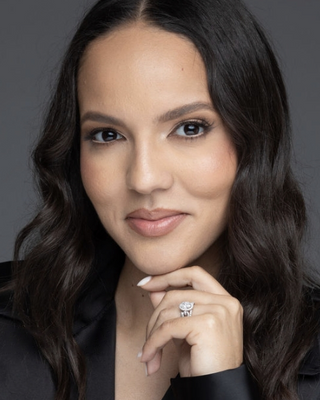 Photo of Amelia Garcia-Baumgardner, Licensed Professional Counselor, MA