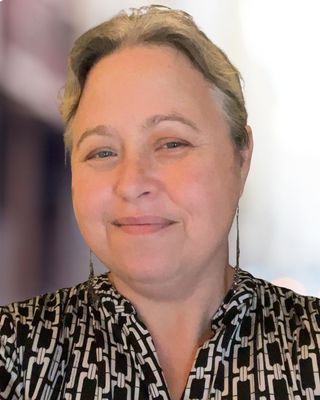 Photo of Meredith McQuagge, Licensed Mental Health Counselor, MA, LMHC, ADHD-CC, ASDCS, C-DBT