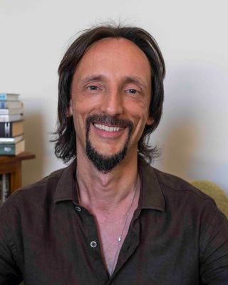 Photo of Ajay Hawkes, Psychotherapist, MA, AMHSW