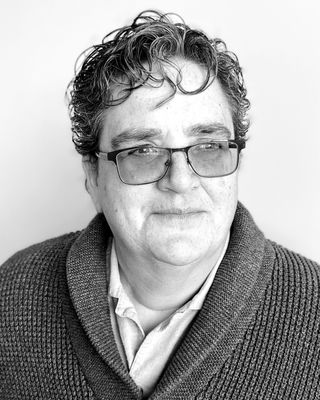 Photo of Mendel Mok, Counselor, LMHC