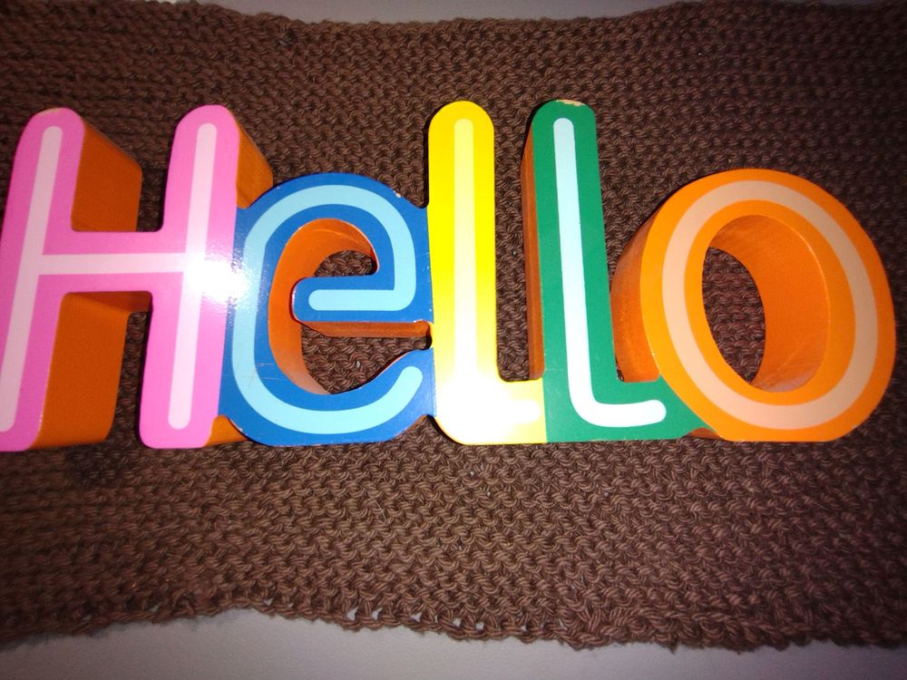Although I work telehealth, this is what my clients often comment on, my Hello sign. Simple, nothing fancy, just hello.