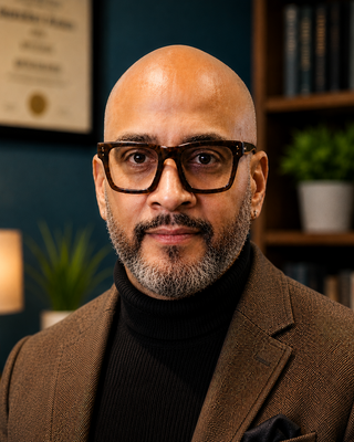 Photo of Owin S. Henry, Counselor, MA, LCPC