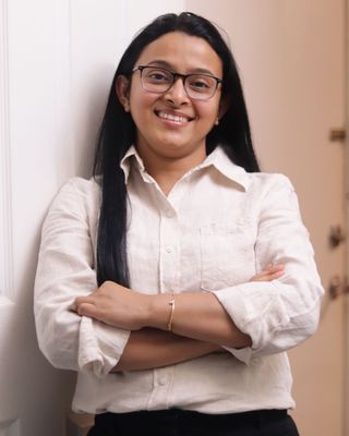 Photo of Mousumi Saha, Registered Psychotherapist, MSc, Mphil