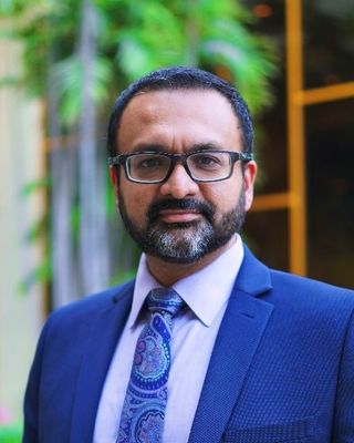 Photo of Dr. Tariq Mahmood Hassan - Summit NeuroCare, Psychiatrist, MBBS, FRCPsyc, FRCPC