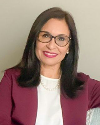 Photo of Alba Colmenares Moore, LMHC, LPC, CCMHC®, NCC®, Counselor