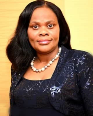 Photo of Dunni Faminu, Psychiatric Nurse Practitioner, PMHNP