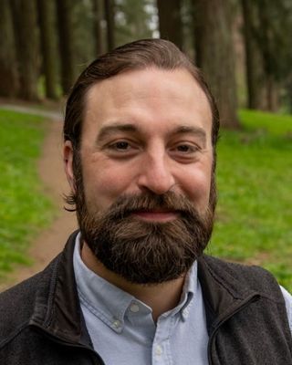 Photo of Alex Farmer, Clinical Social Work Associate