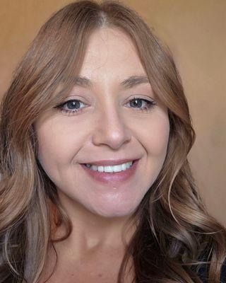 Photo of Enis Fox-Schauffner, Licensed Professional Counselor, MS, LPC, NCC