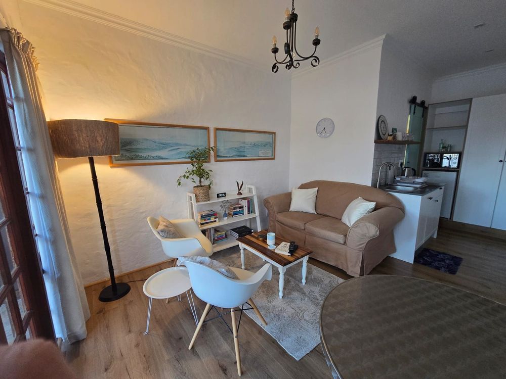A calm, light-filled therapy space designed to feel comfortable, grounded, and welcoming.