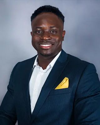 Photo of Theo Sangodele, Psychiatric Nurse Practitioner, PMHNP