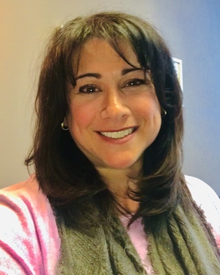 Photo of Melissa Dukofsky, MA, LMHC, LCAT, BC-DMT, CGP, Counselor