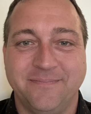 Photo of Elliott Keegan, Licensed Professional Clinical Counselor, LPCC