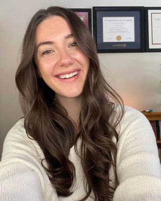 Photo of Chloe Hudson, Registered Psychotherapist, MACP, MSc, BASc