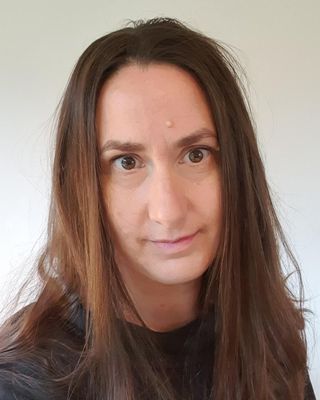 Photo of Clare Burke, Psychotherapist, MA, HCPC-Art Therap.