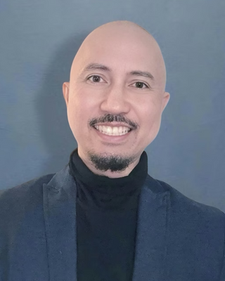 Photo of Marlon Reyes, Psychiatric Nurse Practitioner, PMHNP