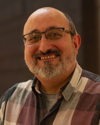 Photo of Michael Estella, Counsellor, BACP