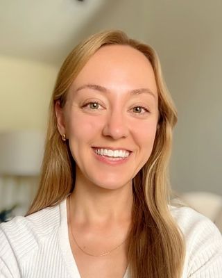 Photo of Emilie Flynn, Licensed Professional Counselor, MA, LPC, R-DMT