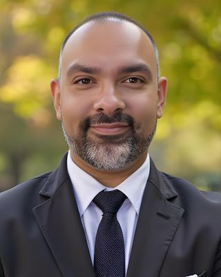 Photo of Dr. Arvind Datt, 35.149528, MD