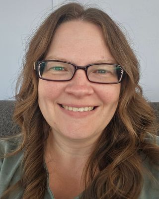 Photo of Holly Mathers, Registered Psychotherapist, BA, MTS, RP