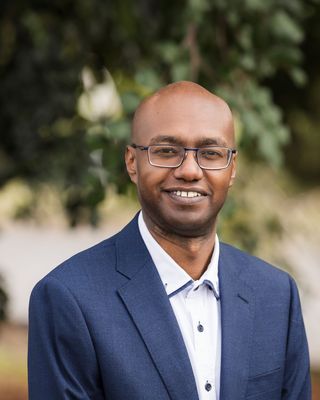 Photo of Mujahid Ahmed, Psychologist, PsyBA General