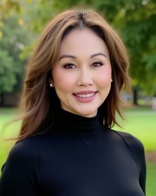 Photo of Dr. Elizabeth Newman, Psychological Associate, PsyD, MA, BCC, AP, CH