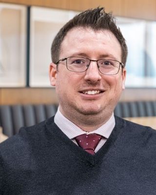 Photo of Justin Stone, Psychiatric Nurse Practitioner, PMHNP