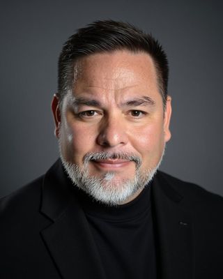 Photo of Oscar Flores Sida, Counselor, MS, NCC, LCPC, LCADC, CPGC