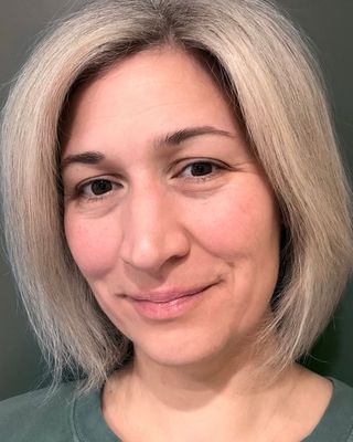 Photo of Dr. Stephanie Lopes, Psychologist, MA, PsyD, CYT