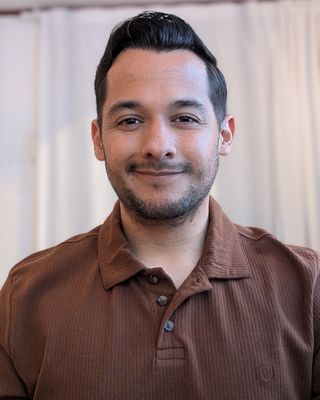 Photo of Adrian Rodriguez, Marriage & Family Therapist, MA