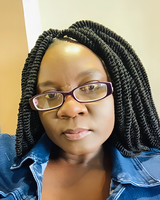 Photo of Marren Onyalo, Drug & Alcohol Counselor, PMHNP