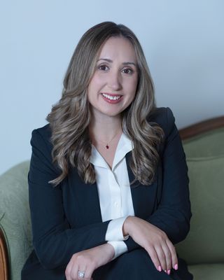 Photo of Elian M Beattie, Licensed Clinical Mental Health Counselor, MS, LMHC, she/her