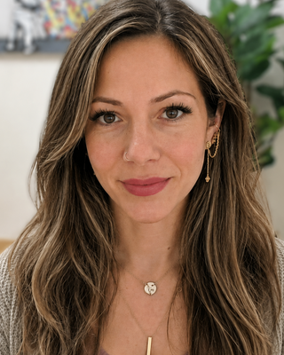 Photo of Amber Miller, Registered Social Worker, MSW, RSW, CCTP, CMIP