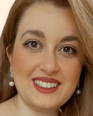 Photo of Dr. Deena Esmeirat, Marriage & Family Therapist, PsyD, LMFT