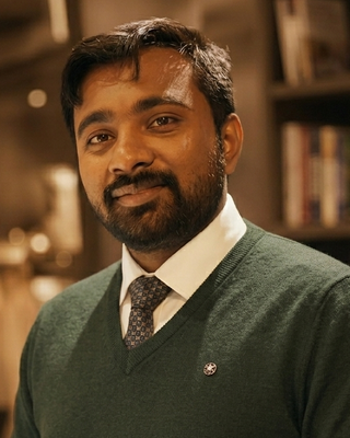 Photo of Albin Issac, Counsellor