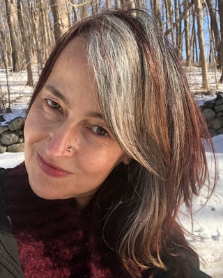 Photo of Nada Khodlová, MA, BC-DMT, LCAT, Creative Arts Therapist