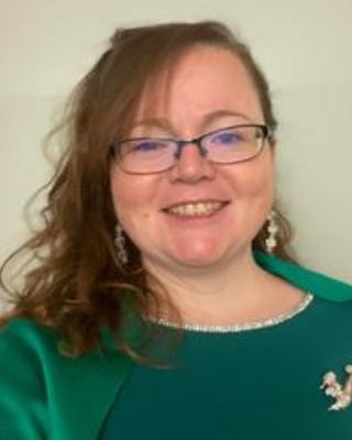 Photo of Caitlin Regan, Licensed Mental Health Counselor, LMHC