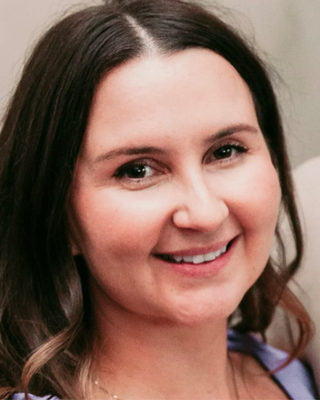 Photo of Delaney Savoie, Counselor, LCPC, CADC