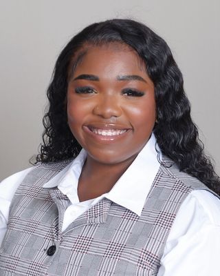 Photo of Aziza Harrell, Pre-Licensed Professional
