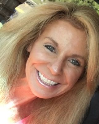 Photo of Karen Larkin, Counselor, MA, NCC, LMHC, CCTP, FNCC