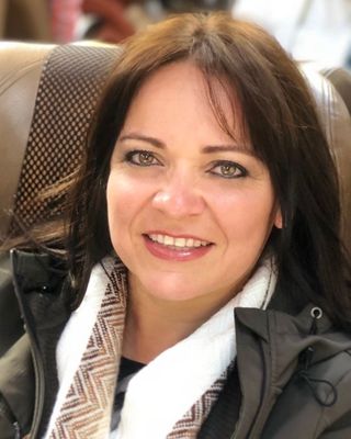 Photo of Attica Yvette Schmidt, Counselor, CMHC